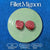 Two raw, marbled fillet mignon steaks on a light green ceramic plate are centered on a deep blue textured background, featuring white text 'Fillet Mignon' at the top and labels for Halal, Grassfed-Natural, and USDA Inspected at the bottom