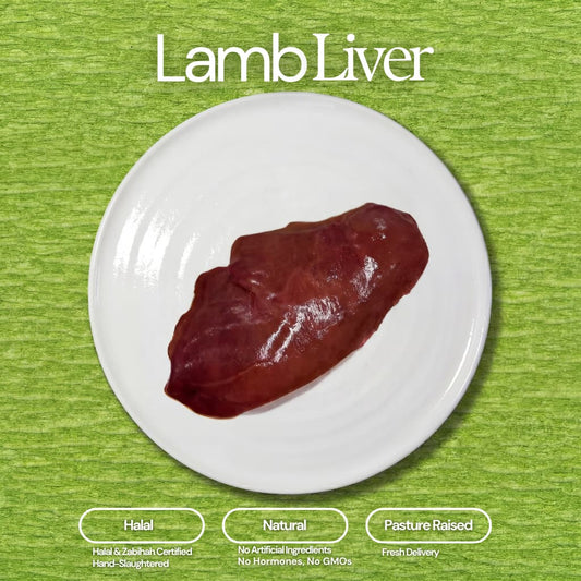 Product photograph of a dark red lamb liver on a white plate against a textured green background, with "Lamb Liver" text at the top and labels detailing "Halal & Zabihah Certified Hand-Slaughtered", "No Artificial Ingredients No Hormones No GMOs", and "Pasture Raised Fresh Delivery"