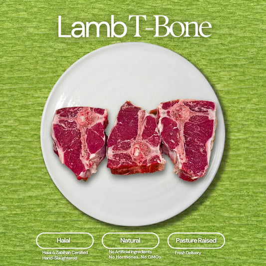 Product photo of three raw, richly marbled lamb T-bone steaks with white bones on a white plate against a vibrant green textured background, highlighted by white 'Lamb T-Bone' text and descriptive labels 'Halal', 'Natural', 'Pasture Raised'