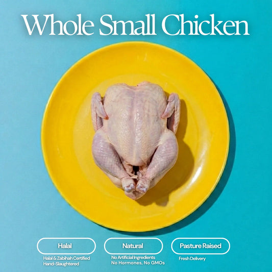 Overhead studio photograph of a raw whole small chicken with light pink skin centered on a vibrant yellow plate against a bright blue background, overlaid with white text "Whole Small Chicken", "Halal", "Natural", and "Pasture Raised"